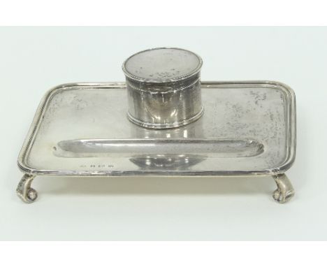 A silver inkstand, Adie Bros., Birmingham 1936, fitted with an inkwell and on scroll feet, 18.5cm wide/Provenance: Plas Gwyn,