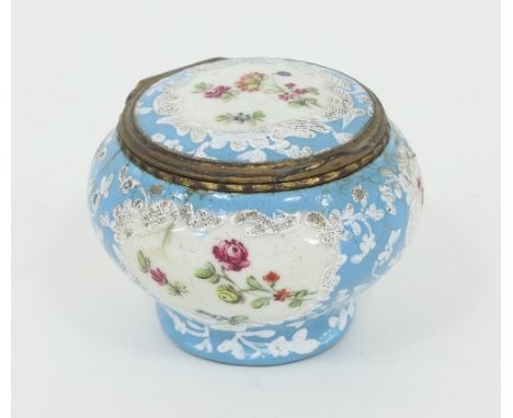 A Bilston enamel box, circa 1780, of circular form with hinged cover, decorated reserves of floral sprays within raised white