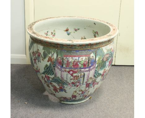 A large Cantonese famille rose planter, painted with military processions, dignitaries and pavilions, 64cm diameter (damages)