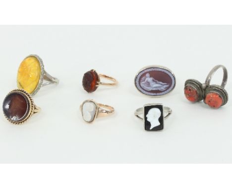 A collection of rings, including a single hardstone intaglio ring, two hardstone cameo rings; three silver cameo rings, etc.,