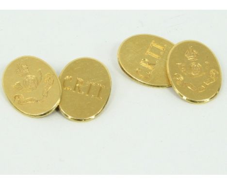 A pair of 18ct gold oval cufflinks, Goldsmiths & Silversmiths Co. Ltd, each bearing initials and insignia of the Kings Own Yo
