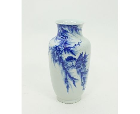 A Chinese baluster vase, 20th Century, decorated in underglaze blue with two birds on a branch, seal mark beneath, 24.5cm hig