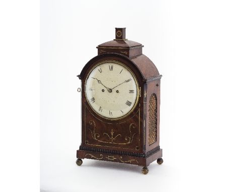 A Regency mahogany cased eight-day bracket clock, inlaid brass banding and acanthus scrolls, fitted a circular white enamel d