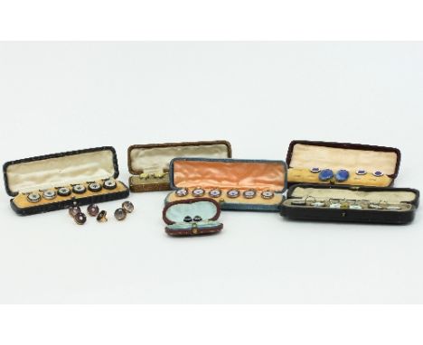 A collection of gentleman's dress studs, including a set of mother-of-pearl and blue enamel, a set of silver and blue enamel,