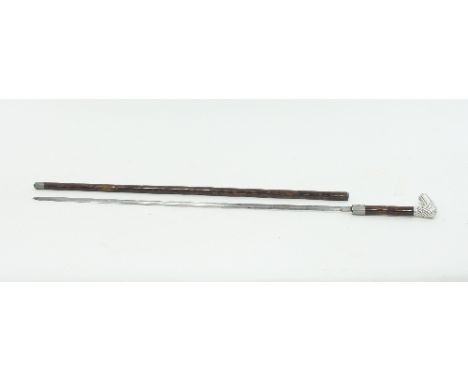 A sword stick, the reeded silver handle with French marks, the blade marked Toledo, 91cm long Condition Report: Condition goo