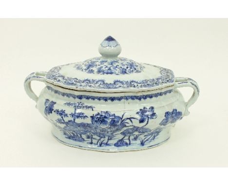 A large Chinese blue and white tureen, late 18th Century, of shaped oval form, the cover with bud finial, the tureen with scr
