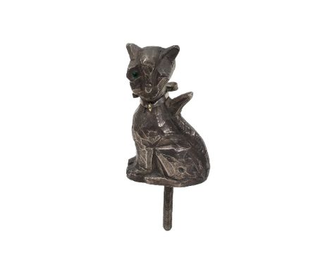 A silver bonnet mascot in the manner of Louis Wain, NH, London 1910, the cat winking and with ribbon tie around its neck, 9.5