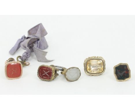 A 19th Century fob seal, the bloodstone matrix with crest of Cubitt and others, four further fob seals including 'Paix a mon 