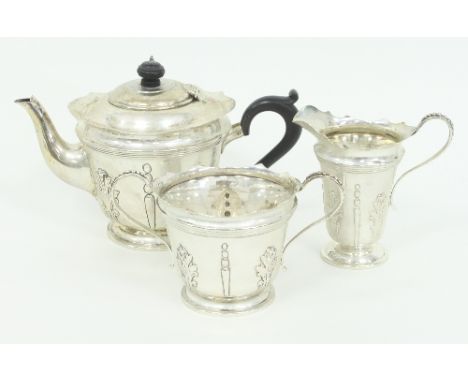 A silver three-piece tea service, Mappin & Webb, London 1903, with wavy rims and acanthus leaf decoration, approximately 980g