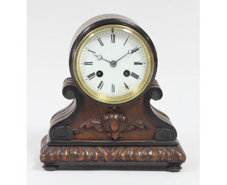 A 19th Century oak cased eight-day mantel clock with circular white enamel dial, the drum shaped movement striking on a bell,