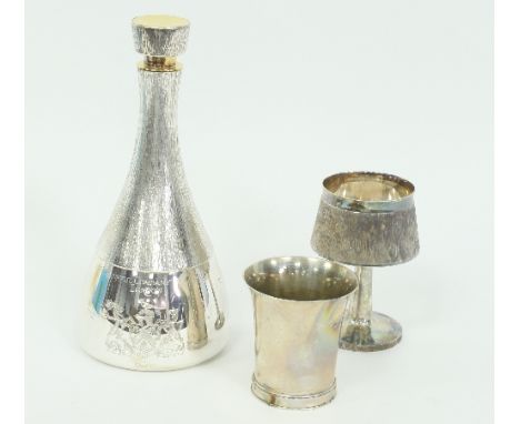 A silver decanter, C J Vander, London 1976, with textured stopper and neck above a polished body inscribed to Peter Sherrard 