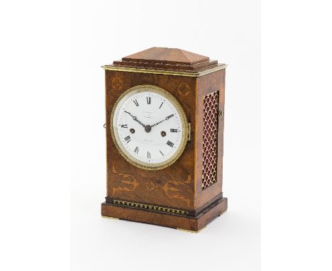 A Regency figured walnut quarter-strike ting-tang bracket clock, the rectangular case with stepped top and with pierced grill
