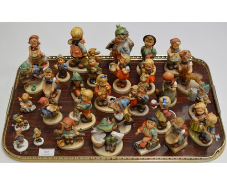 A COLLECTION OF 30 VARIOUS HUMMEL FIGURINE ORNAMENTS     