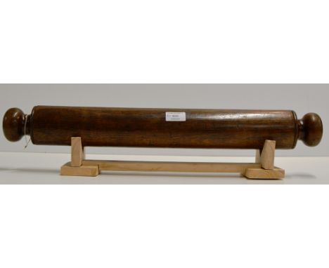 AN UNUSUAL ANTIQUE (POSSIBLY 18TH CENTURY) OAK SCROLL ROLLER/HOLDER, WITH RELATED SLOT AND HOLE TO ENDS