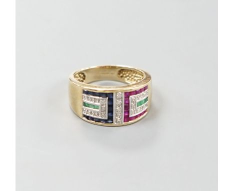 A modern 9ct gold, emerald, ruby, sapphire and diamond set geometric dress ring, size Q, gross weight 5.3 grams.