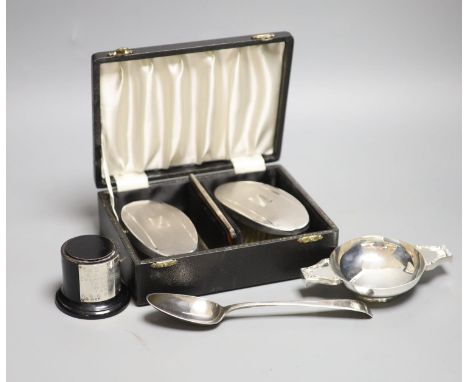 A cased pair of silver clothes brushes, silver quaich-type trophy and a George III silver dessert spoon.