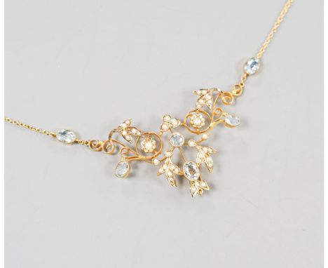 An Edwardian 9ct, aquamarine and seed pearl set drop pendant necklace, 40cm, gross weight 7.2 grams.