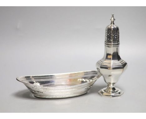 A late Victorian pierced silver oval dish, Sheffield, 1896, 18.7cm and a later silver sugar caster, 6.5oz.