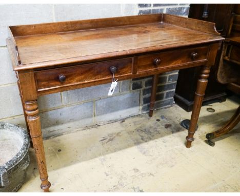A Victorian mahogany two drawer side table stamped "Wilkinson Great Queens St", width 105cm, depth 51cm, height 81cm