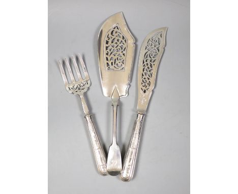A pair of Victorian silver fish servers with loaded handles, Sheffield, 1853 and a Victorian silver fiddle pattern fish slice
