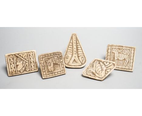 A group of five Middle eastern ceramic moulds/stamps