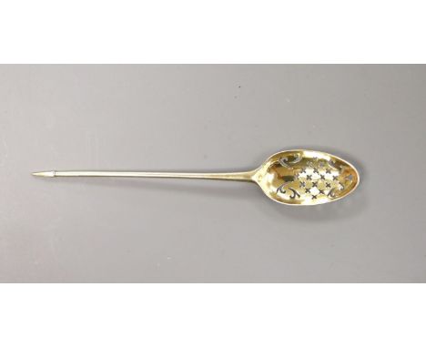 A mid 18th century silver gilt mote spoon, 13.6cm, indistinct marks.