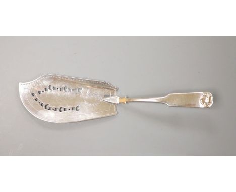 A George III Scottish silver fiddle and shell pattern fish slice, John Graham, Edinburgh, c. 1806 (marks rubbed), 30cm, 139 g