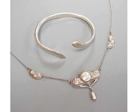An Art Nouveau style sterling  and mother of pearl set pendant necklace, stamped Queensway, 62cm and a white metal bangle.