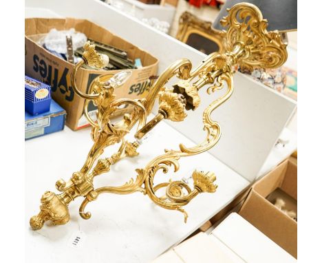A rococo revival ormolu seven light chandelier 82cms