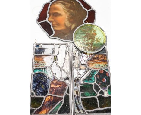 A Victorian stained glass portrait panel, two bird panels and a similar circular bird panel (4)