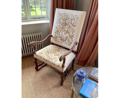 A 19th century French mahogany armchair, with later floral tapestry back and seat, width 65cm height 116cm