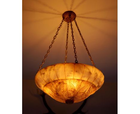 A foliate carved alabaster light bowl, diameter 56cm drop including chains 90cm