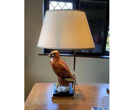 A Continental porcelain owl lamp base, with lacquered brass mounts, height of base 45cm