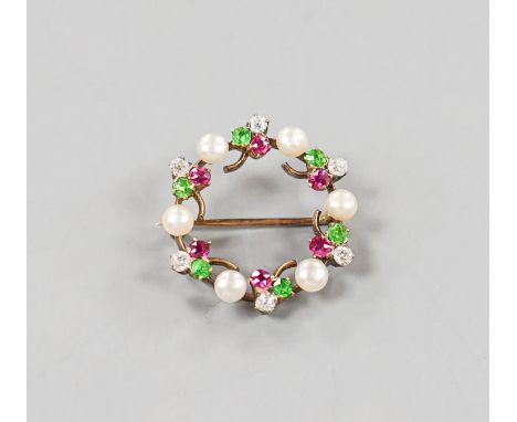 An early 20th century yellow metal, cultured pearl, ruby, garnet and diamond set openwork circular brooch, 25mm, gross weight