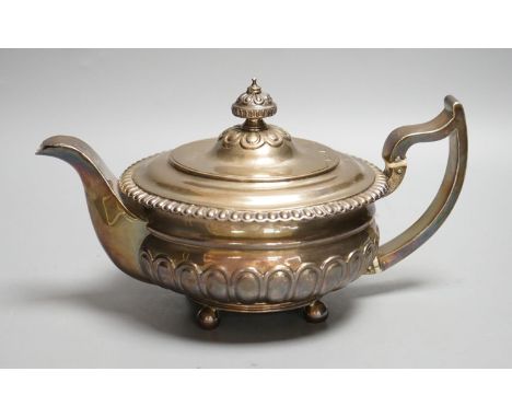 A George III silver teapot, Soloman Hougham, London, 1813, gross 23.5oz.
