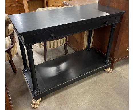 An ebonised and gilt console table 