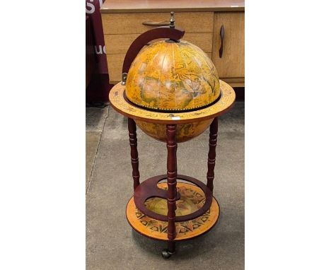An Italian style terrestrial globe cocktail cabinet/trolley 
