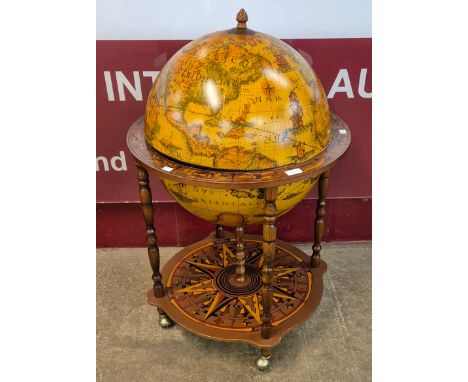 An Italian terrestrial globe cocktail cabinet/trolley 