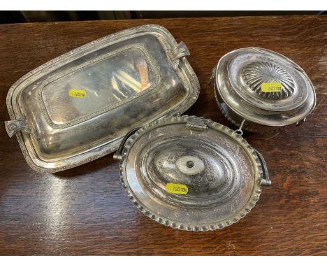 Two silver plated tea caddies and a celtic revival serving dish and cover by Garrards