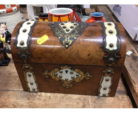 Victorian Gothic walnut dome topped tea caddy, with ivory and engraved gilt metal mounts. The hinged cover enclosing twin lid