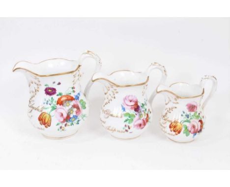 Three graduated Staffordshire porcelain jugs, each with matching inscriptions and dated 1856, with polychrome painted flowers