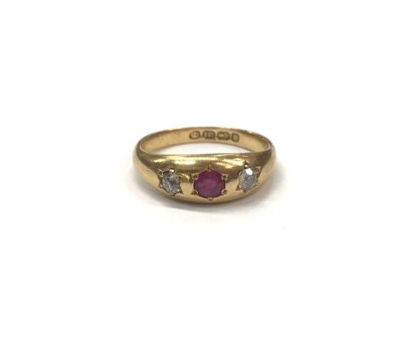 Victorian 18ct gold ruby and diamond three stone gypsy ring with central round mixed cut ruby flanked by two old cut diamonds