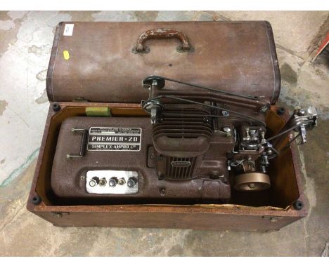 Vintage Ampro film projector and film (two cases)