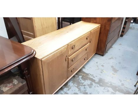 Good quality Blonde Ercol Windsor 455 sideboard with three central drawers flanked by cupboards, 154.5cm wide, 43cm deep, 68c