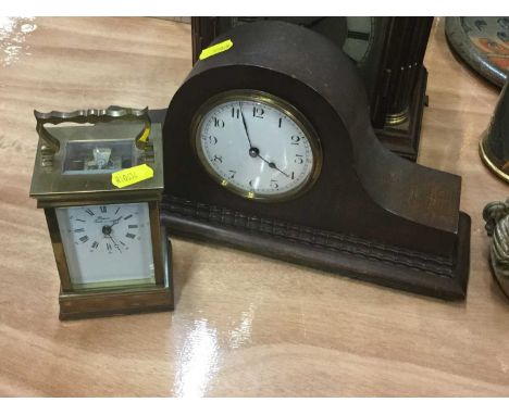 French brass carriage clock, together with a small early 20th century mantel clock.