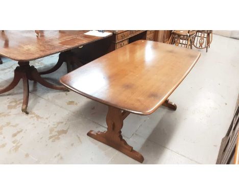 Ercol dining table on end standards joined by stretcher, 152cm x 84cm x 72cm high, together with four dining chairs