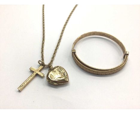 9ct gold child's bangle and a 9ct gold chain, 55.5cm long, with heart locket and cross pendantTotal weight 19.6 grams