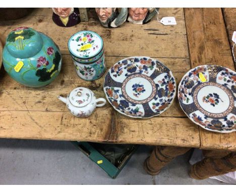 19th century Chinese famille rose teapot with figures and calligraphy, two 18th century Japanese dishes, a Canton enamel box 