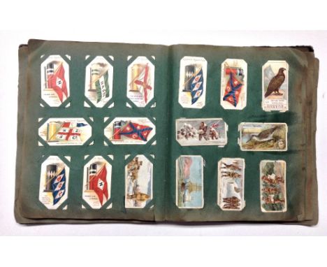 Cigarette and Trade Cards in album, odds, including George Payne Dickens (10) [lot]