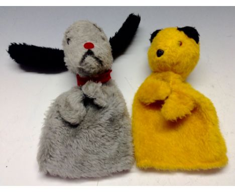 A Chad Valley Sootie glove puppet, 23cm high;  another, Sweep, with squeezer,  with labels (2)